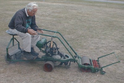 The Rendle Mower Pusher could be used with almost any lawn mower and is shown here with a Greens Silens Messor.